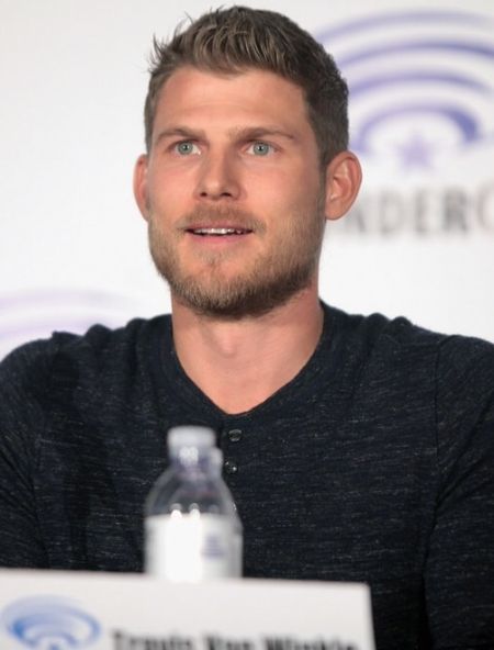 Travis Van Winkle caught on the camera in the black t-shirt.